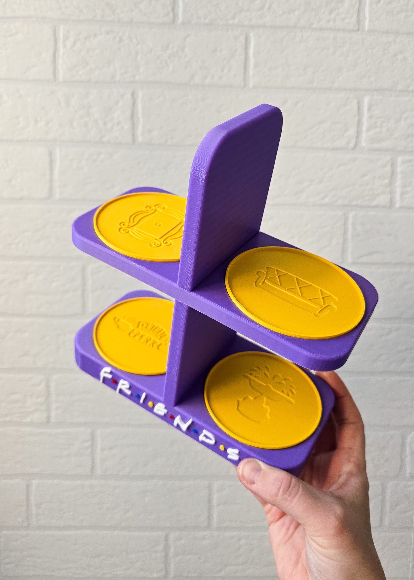 Fioletowy stojak na kubki inspirowany serialem "Przyjaciele"