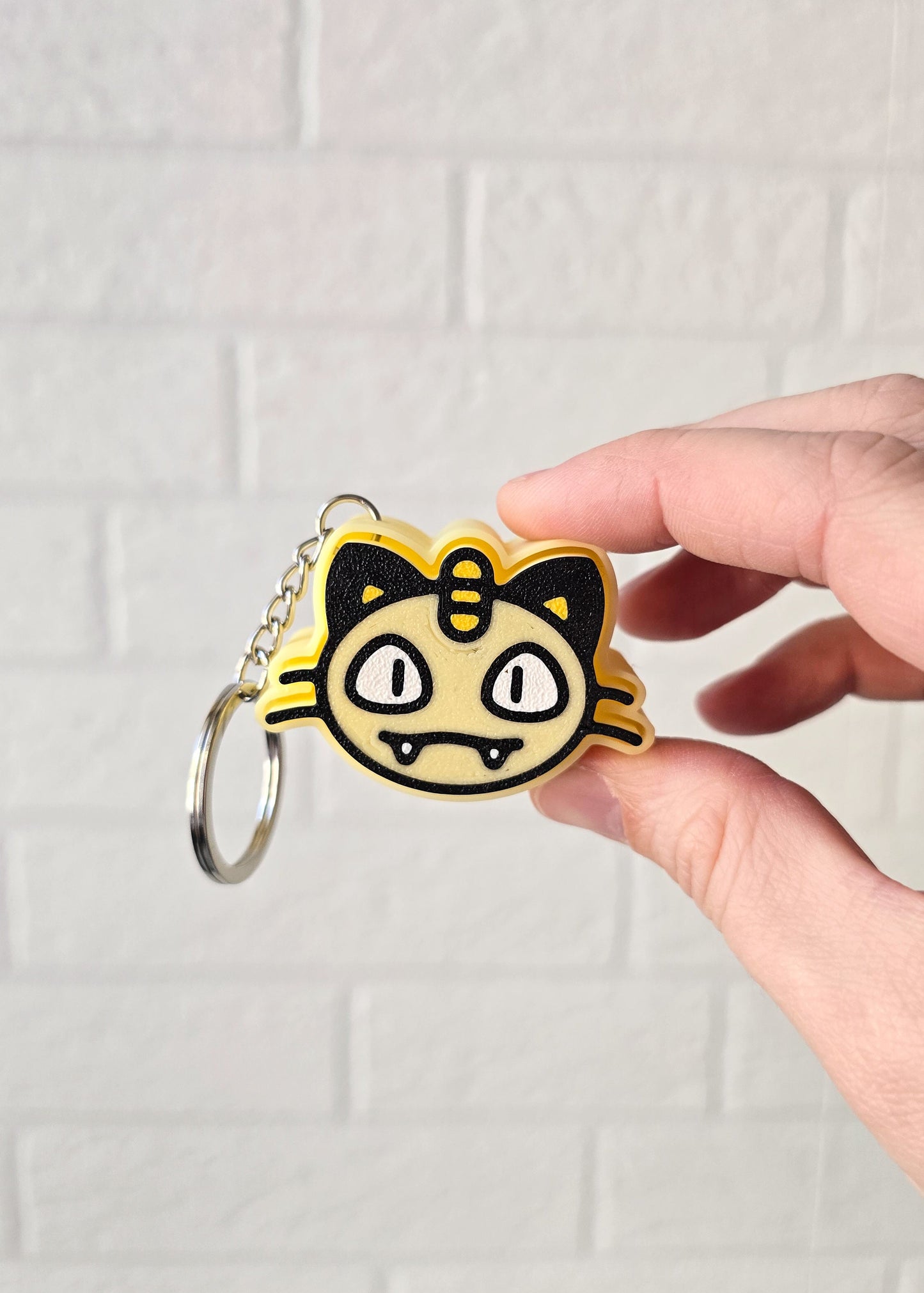 Kliker MEOWTH - POKEMON